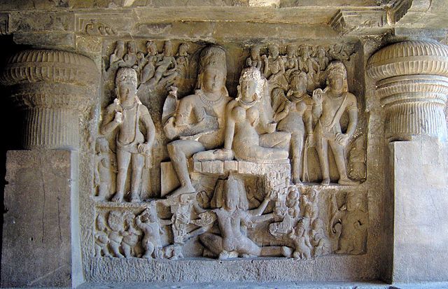 Shiva-Parvati seated on mount Kailash, while Ravana tries to lift it.