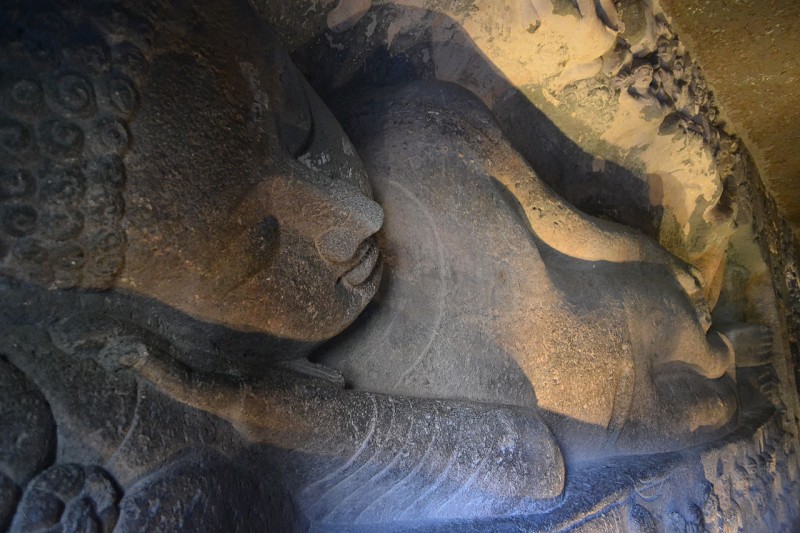 The picture shows a beautiful image of reclining Buddha at cave no. 26 at Ajanta caves