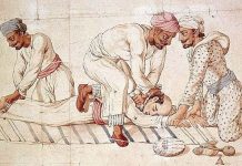 A groups of Thugs strangling a traveller on a highway in India in the early 19th century.