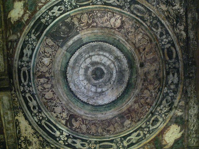 Painted ceiling from a Cave Temple at Ajanta enclosing lotus flowers