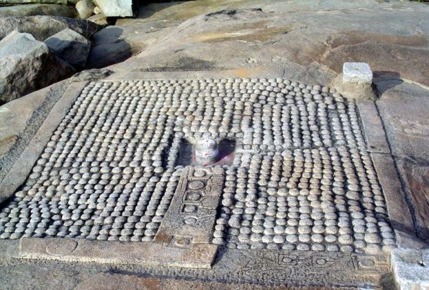 1008 Lingas carved on a rock surface at the shore of the river Tungabhadra, Hampi, India